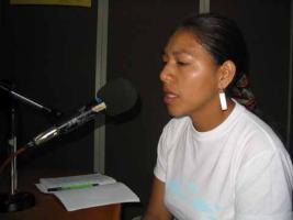 Dora on the Microphone at Radio Payumat in the Cauca Region of Colombia